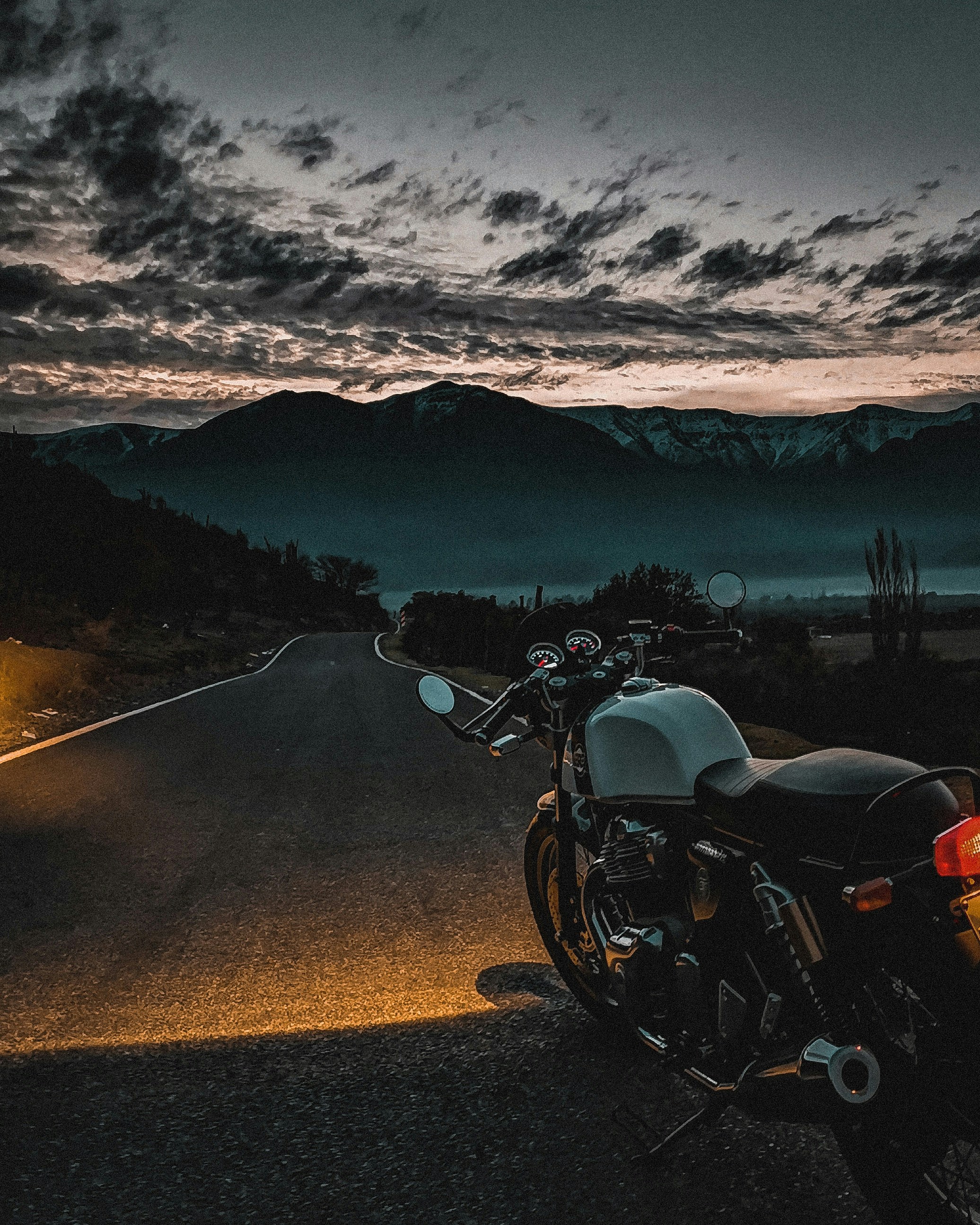 Motorcycle parked on a Himalayan mountain road